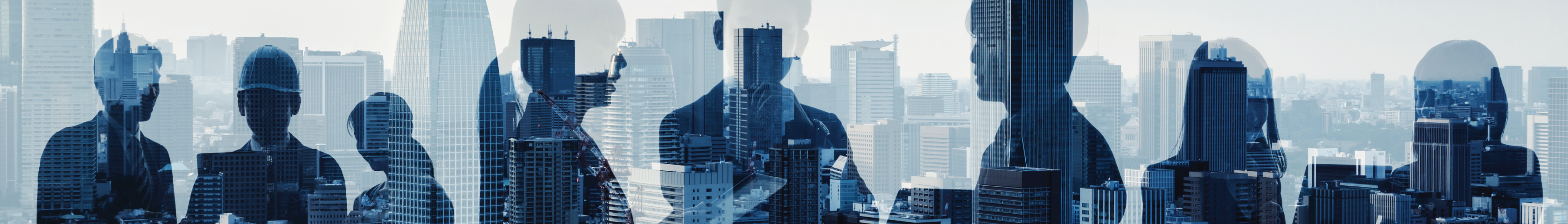 Business people silhouette over background of city skyline