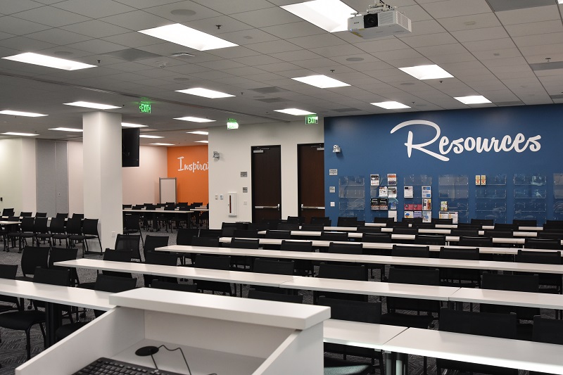 Large training room filled with desks and chairs