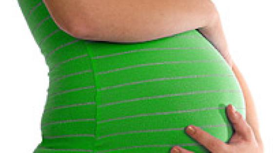 Pregnant green shirt 2