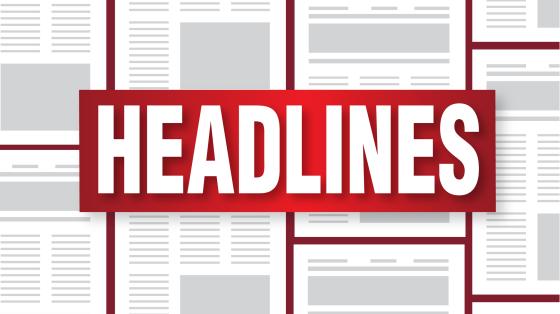 Headlines in white letters with red background and papers