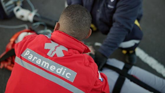 paramedic attending to person on floor