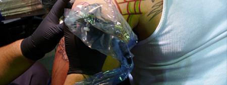 Man getting Bodyart on shoulder