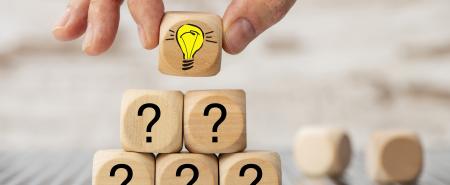 Innovation Banner - Cube with a light bulb