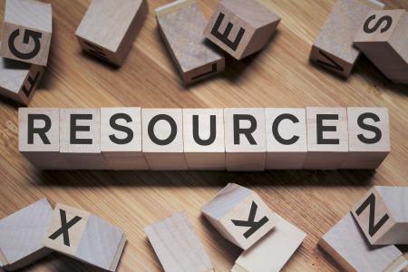 Wooden blocks with letters spelling "RESOURCES"